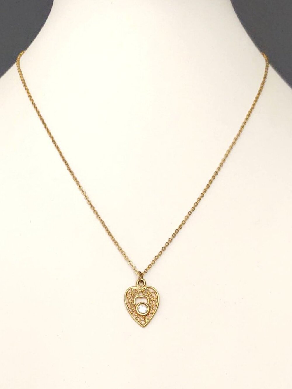 Heart pendant necklace with clear cz accent